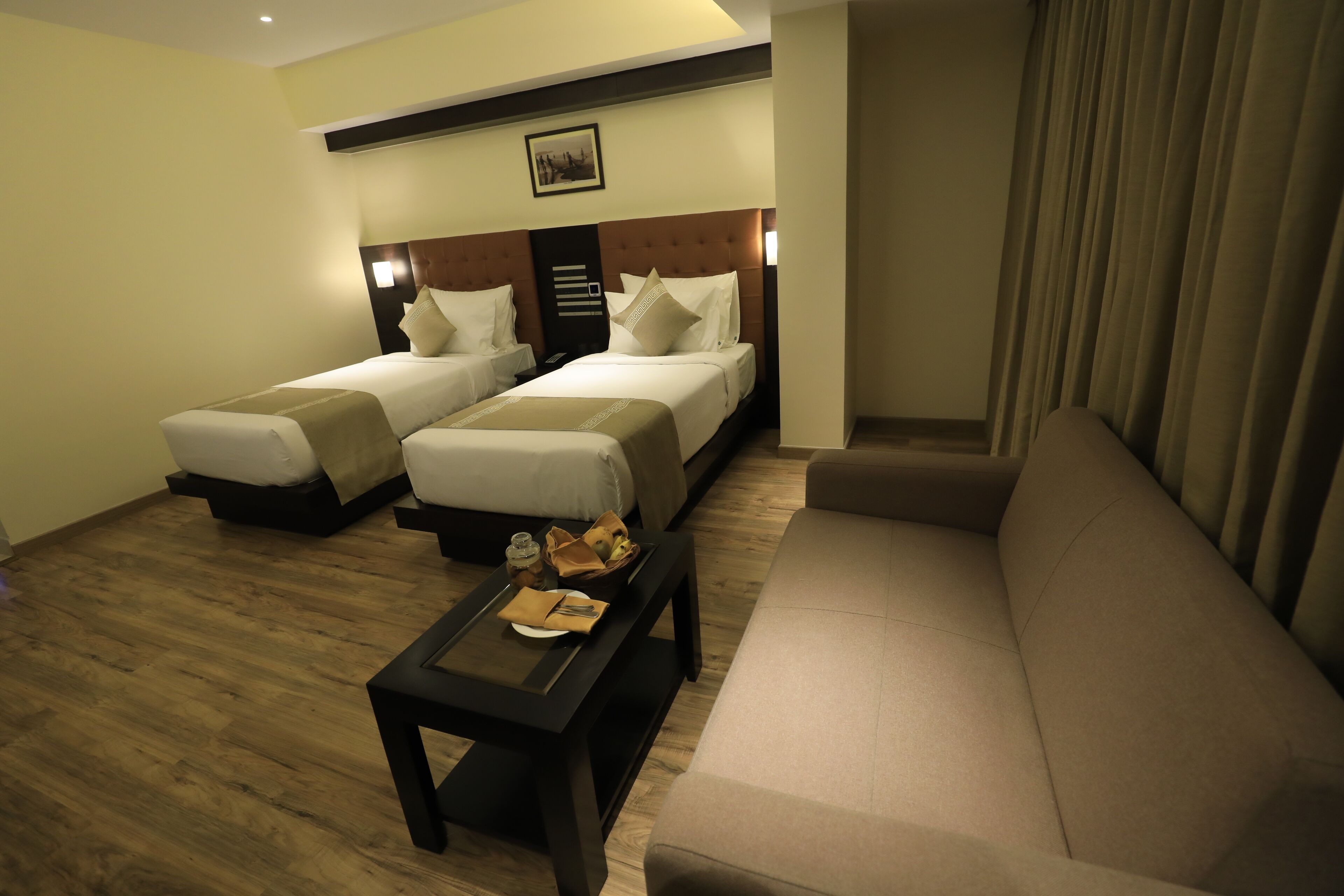 deluxe double room | living room | flat-screen tv