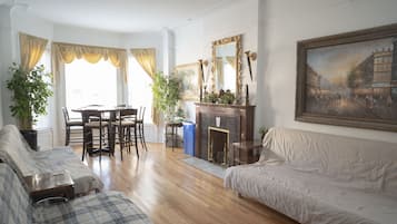 Smart TV, fireplace, books