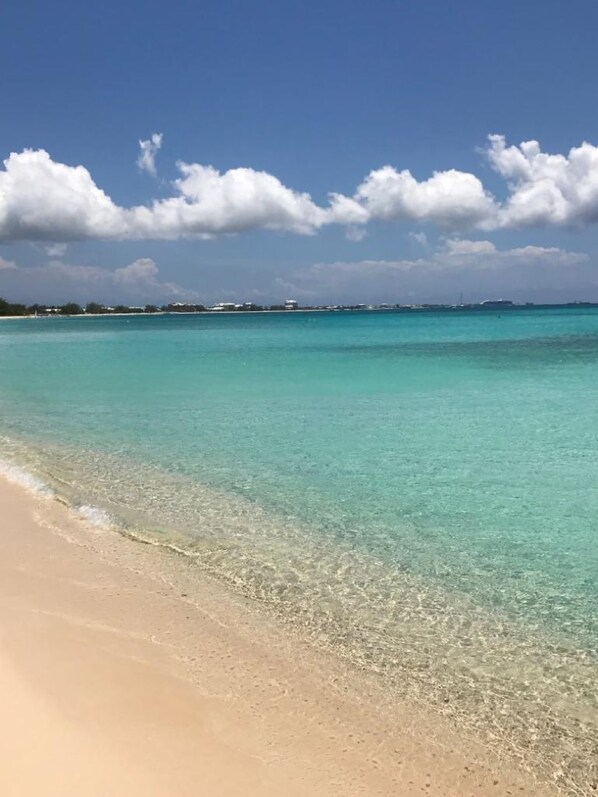 On the beach, sun-loungers, beach towels