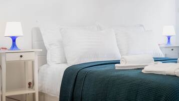 3 dormitoris, planxa i posts de planxar i un bressol de viatge