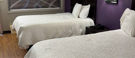 Blackout drapes, iron/ironing board, free WiFi, bed sheets