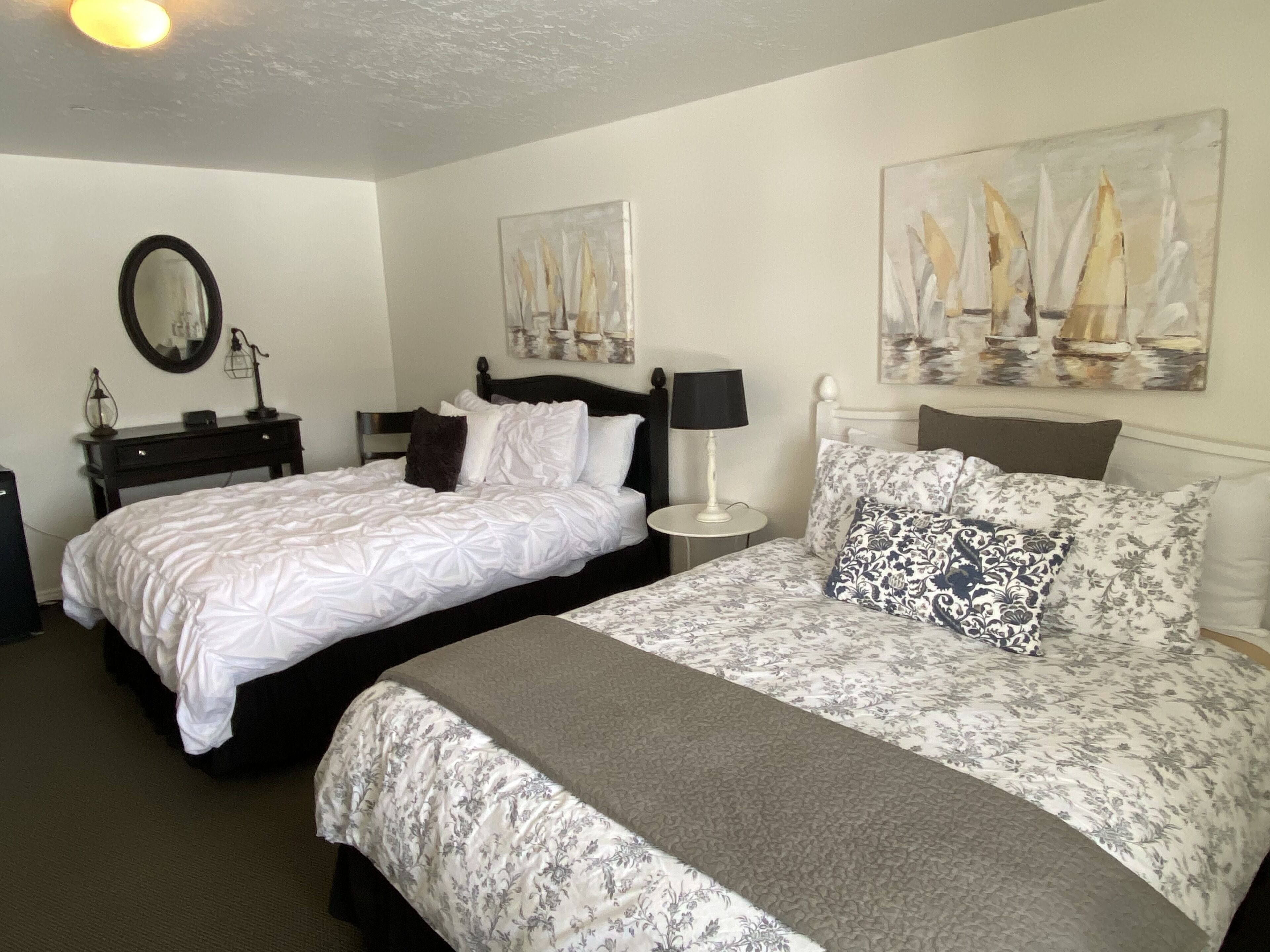 comfort room, 2 queen beds, garden view | memory-foam beds, blackout curtains, iron/ironing board, free wifi