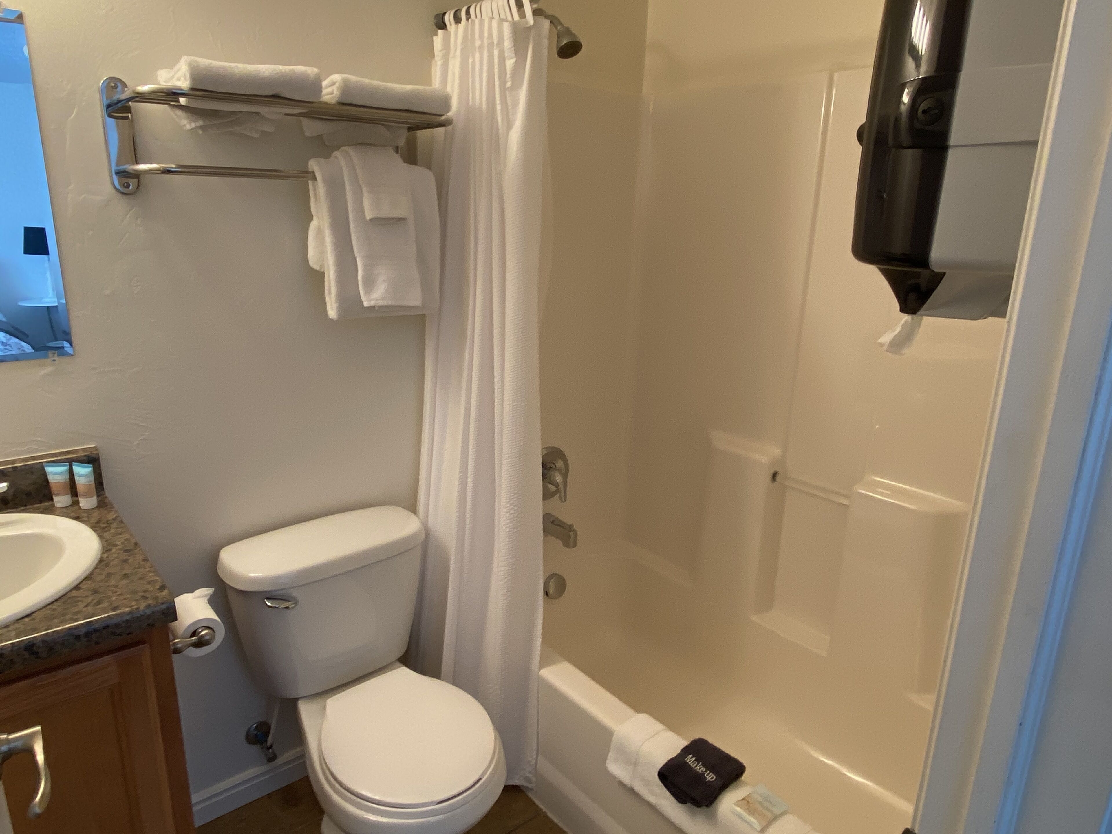 comfort room, 2 queen beds, garden view | bathroom | designer toiletries, hair dryer, towels, soap