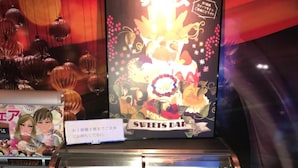 A sweets bar with a glass display case containing various desserts. - Hotel Gaudium - Adult Only (Kuki)