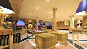 A spacious lobby with a central seating area, multiple lamps, and a reception desk. - JAZ Crown Emperor Nile Cruise - Every Thursday from Luxor for 07 & 04 Nights - Every Monday from Aswan for 03 Nights (Luxor)