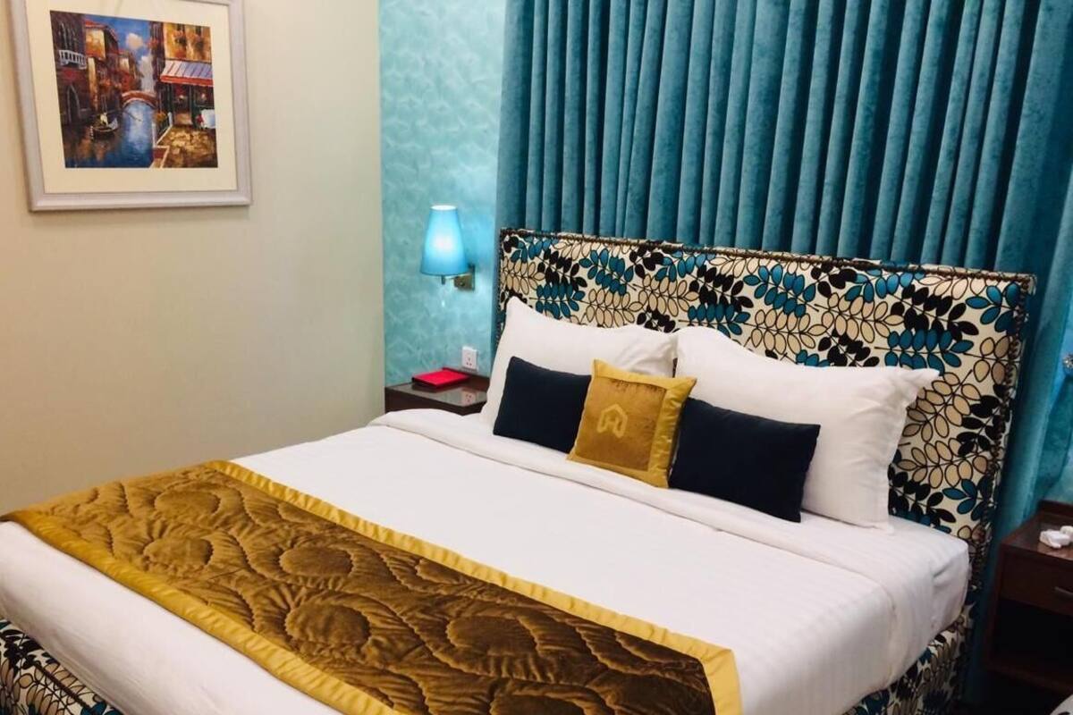 Suite Deluxe | Ropa de cama de alta calidad y edredones de plumas