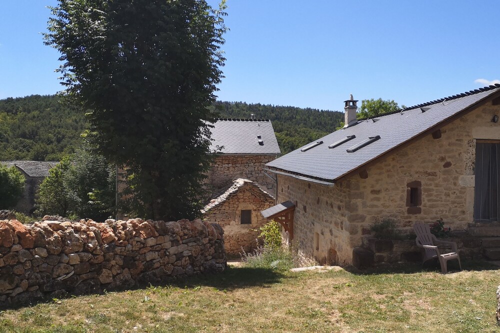 Cozy cottage between stones and modernity