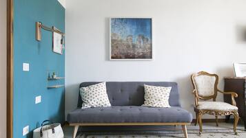 Quarto família, vista para a cidade | Comodidades do quarto