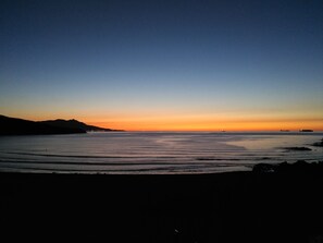 On the beach, sun loungers, beach towels