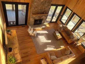 TV, fireplace, books