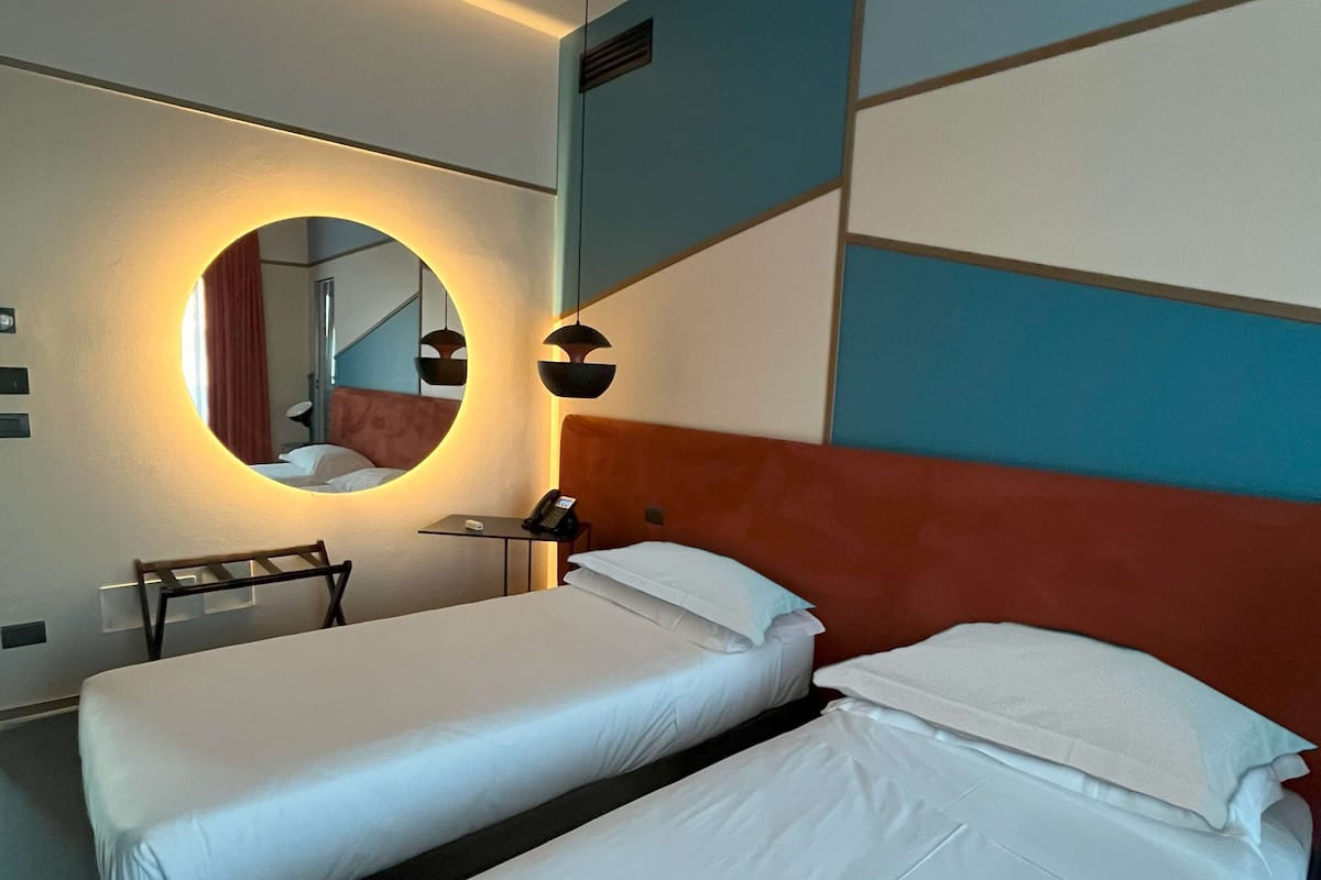 Premium bedding, down duvets, minibar, in-room safe