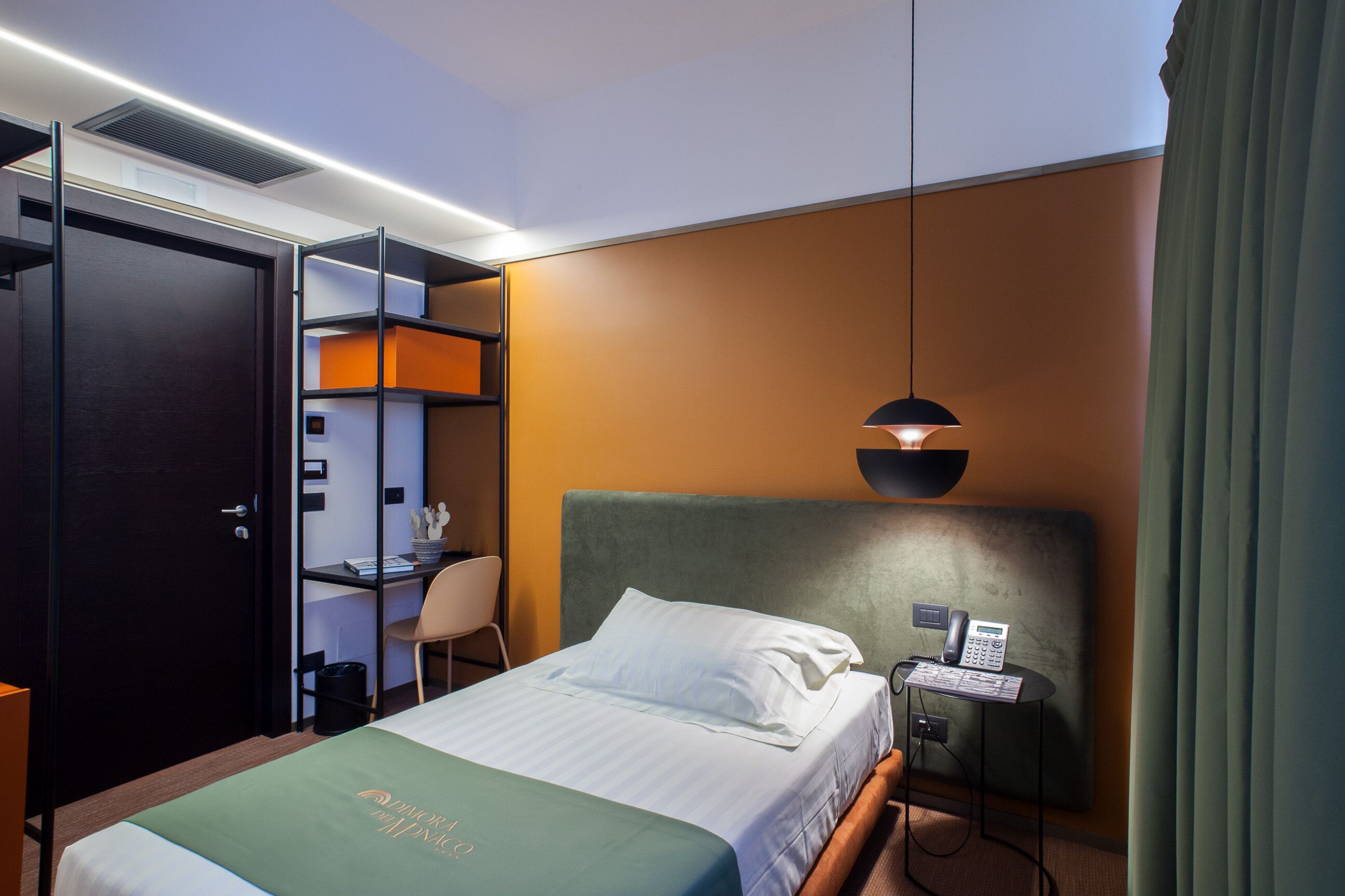 premium bedding, down duvets, minibar, in-room safe