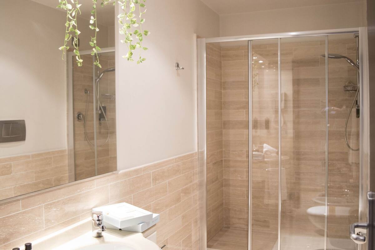 comfort room | bathroom | shower, rainfall showerhead, eco-friendly toiletries, hair dryer