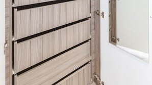 A wooden wardrobe with multiple drawers and a shelf. - Flat 5 · Stunning 2-Bed Notting Hill Portobello Apartment (London)