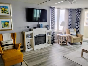 Smart TV, fireplace, DVD player, books