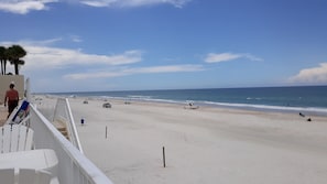 On the beach, sun loungers, beach towels