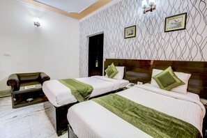 Tabla de planchar con plancha, wifi gratis y ropa de cama 