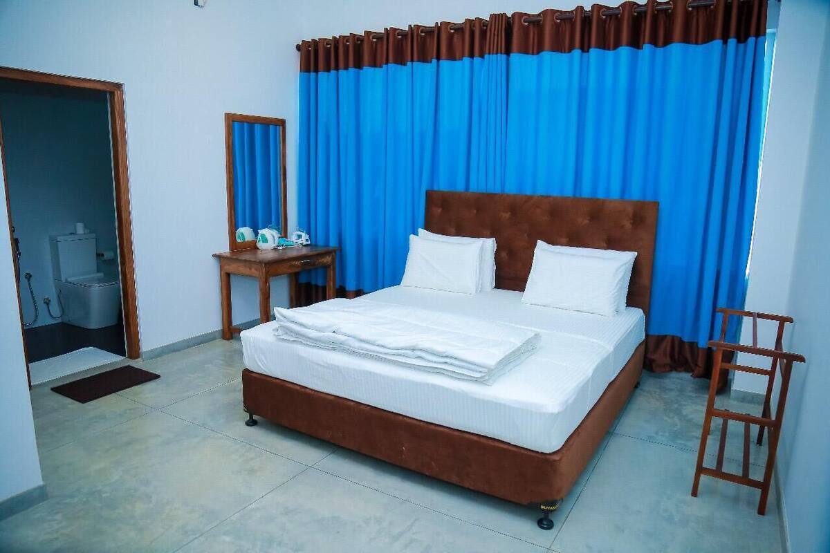 Habitación Deluxe doble, 2 habitaciones, vistas al mar | Escritorio, espacio para trabajar con un portátil, cortinas opacas