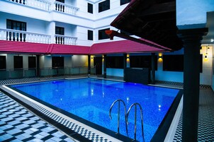 Outdoor pool, open 8:00 AM to 6:30 PM, pool umbrellas, sun loungers