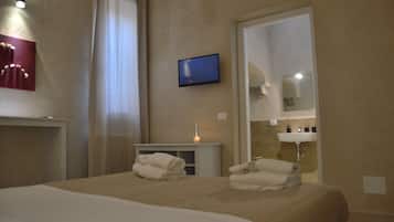 Habitación doble Deluxe | Minibar, escritorio, wifi gratis y ropa de cama