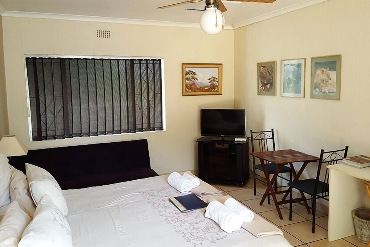 Suite familiar | Escritorio, wifi gratis y ropa de cama 