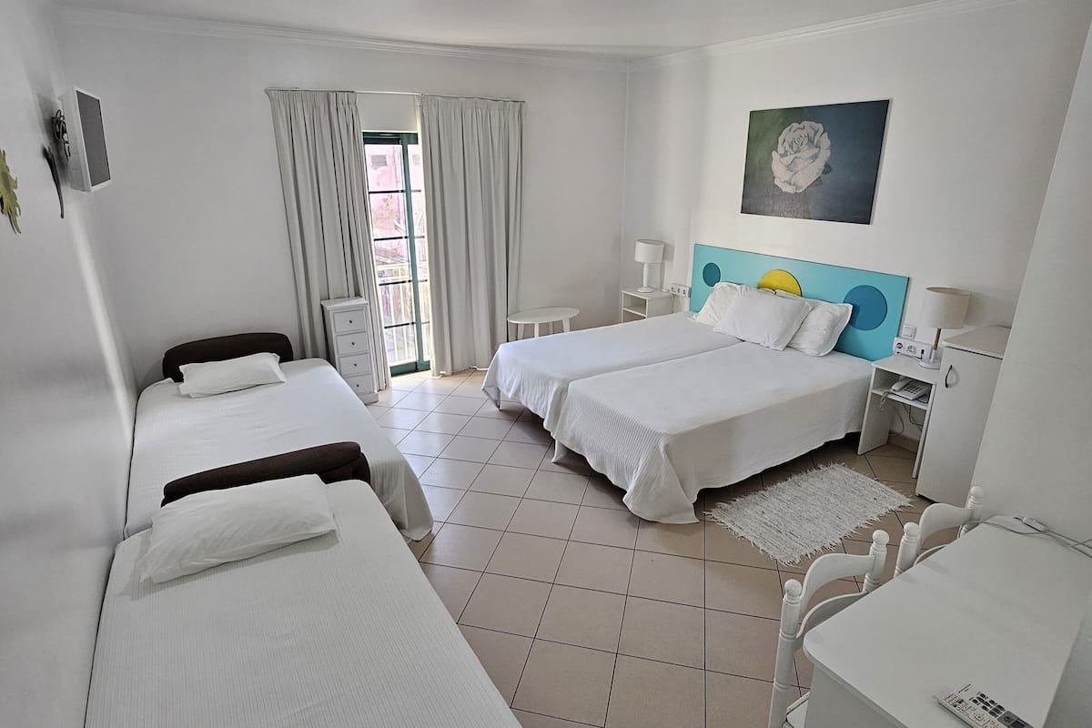 quadruple room | in-room safe, desk, blackout curtains, cots/infant beds