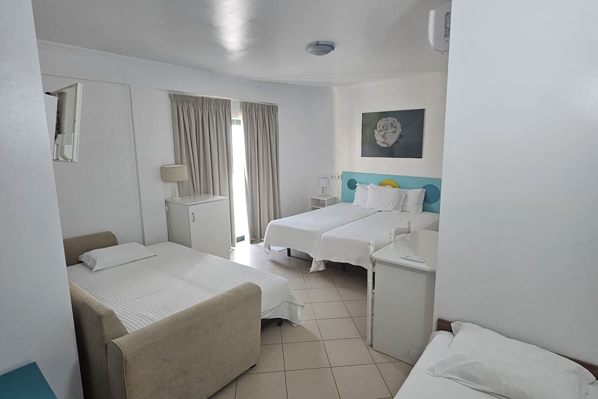 quadruple room | in-room safe, desk, blackout curtains, cots/infant beds