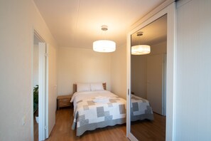 Apartment, 1 Bedroom | 1 bedroom, desk, laptop workspace, iron/ironing board