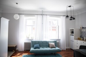 Apartment | Living area | 9999-cm Smart TV with digital channels, TV, MP3 dock - Old town Library Tartu Home Apartments (Tartu)