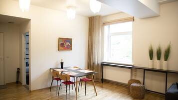 Deluxe Apartment | Living area | TV