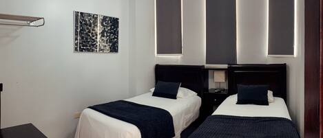 Habitación básica con 2 camas individuales | Wifi gratis y ropa de cama