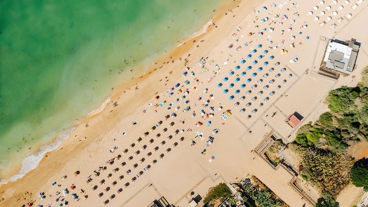 On the beach, sun-loungers, beach towels
