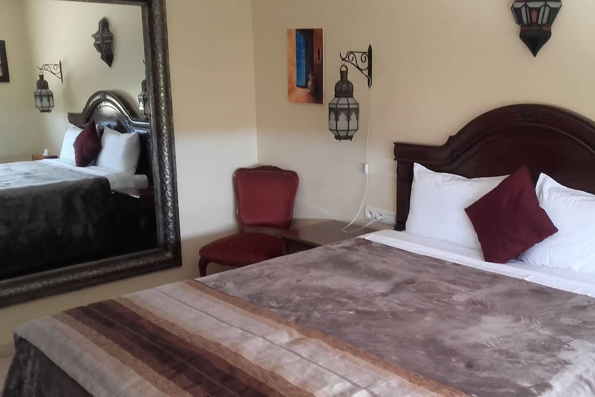 Blackout drapes, soundproofing, iron/ironing board, free WiFi