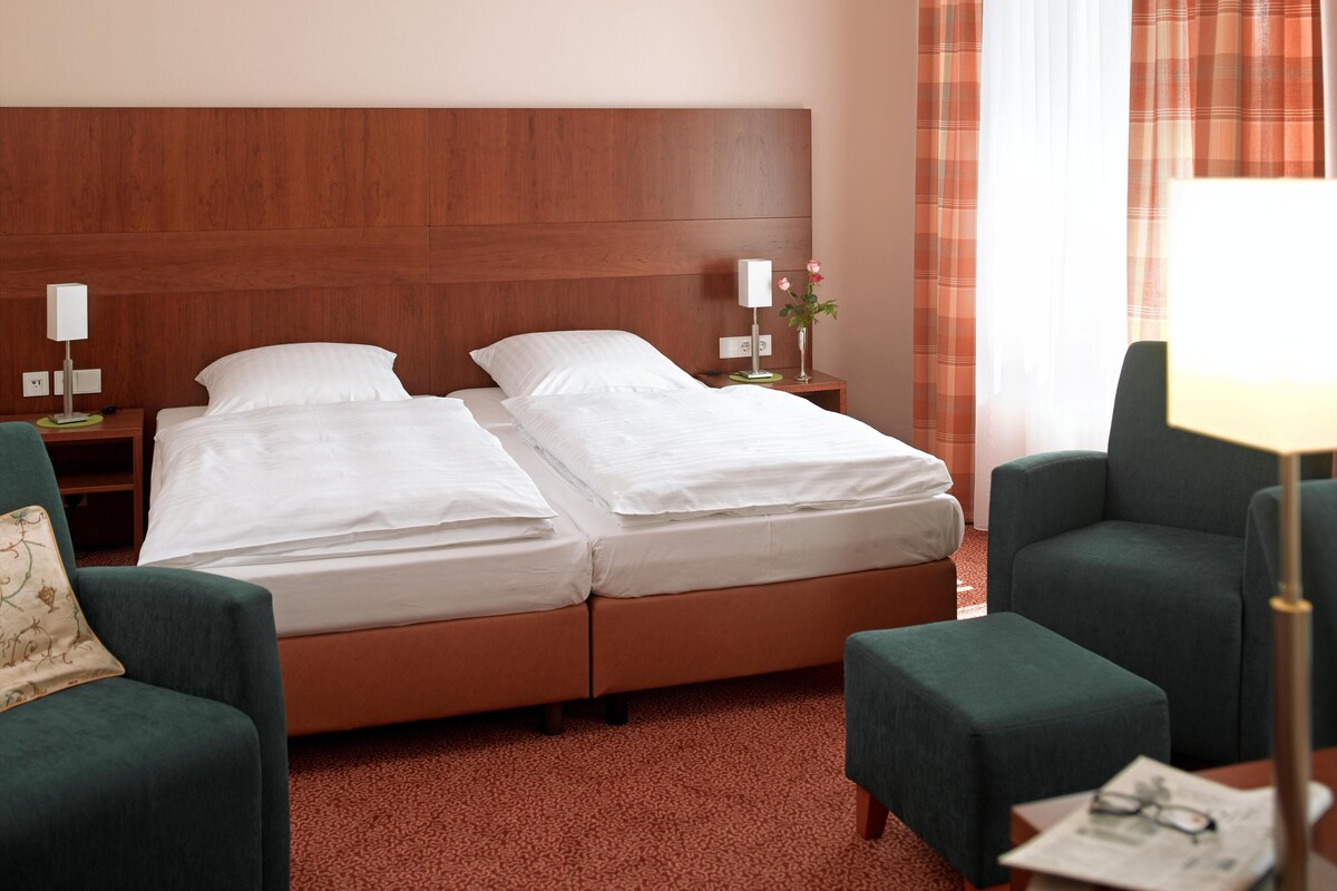 In-room safe, desk, iron/ironing board, cribs (free)