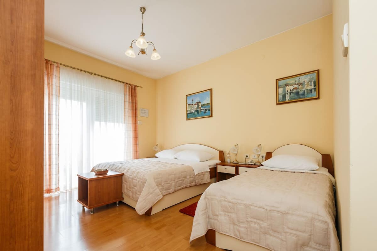 Basic Double or Twin Room | Desk, free cots/infant beds, free WiFi, bed sheets