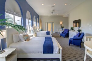 Deluxe Suite | Cortinas blackout, ferros/tábuas de passar roupa, Wi-Fi de cortesia