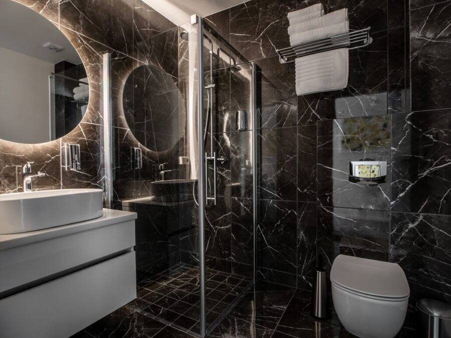 Shower, slippers, towels, soap