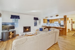 Appartement, meerdere bedden, patio (1848) | Woonruimte | Een open haard