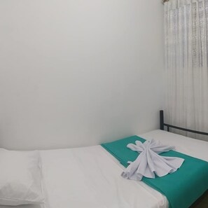 Single Room | Premium bedding, blackout curtains, iron/ironing board, free WiFi