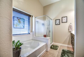 Combined shower/bathtub, hair dryer, towels, soap