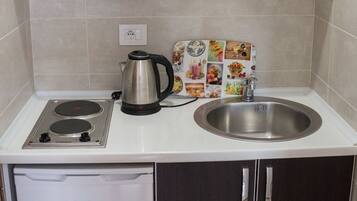 Classic Studio, Balcony | Private kitchenette | Fridge, stovetop, electric kettle, cookware/dishes/utensils