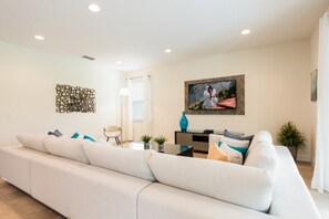 Villa (1 Bedroom) | Living room | Flat-screen TV