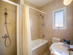 A bathroom with a shower, bathtub, toilet, and sink. - Beautiful Villa With Private Pool, Protaras Villa 1010 (Paralimni)