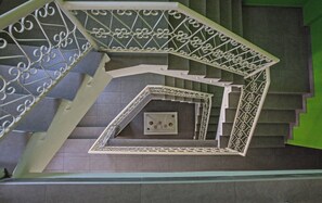 A spiral staircase with ornate metal railings and a geometric design. - Luxury Apartment in Cyprus near Beach, Ayia Napa Apartment 1323 (Ayia Napa)