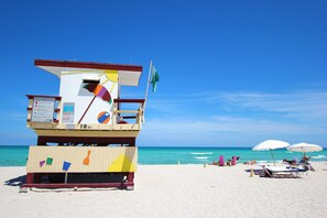 Na praia, toalhas de praia 