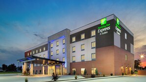 A Holiday Inn Express hotel with a modern design, featuring a covered entrance and multiple windows. - Holiday Inn Express & Suites St Peters by IHG (St. Peters)