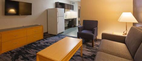 Desk, laptop workspace, blackout drapes, iron/ironing board