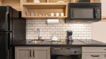 Desk, laptop workspace, blackout drapes, iron/ironing board