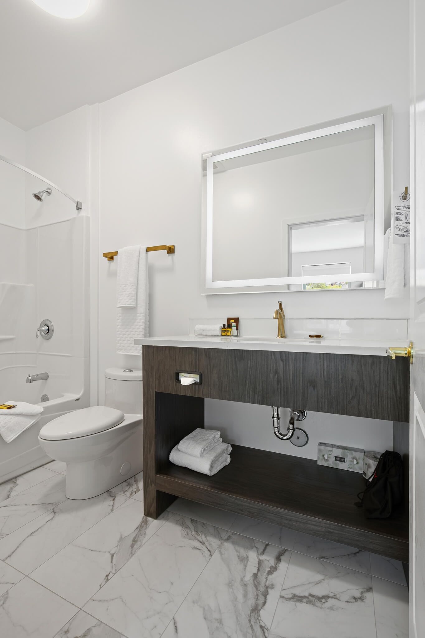 suite, 1 king bed, non smoking (living room;queen sofabed) | bathroom | free toiletries, hair dryer, towels, soap