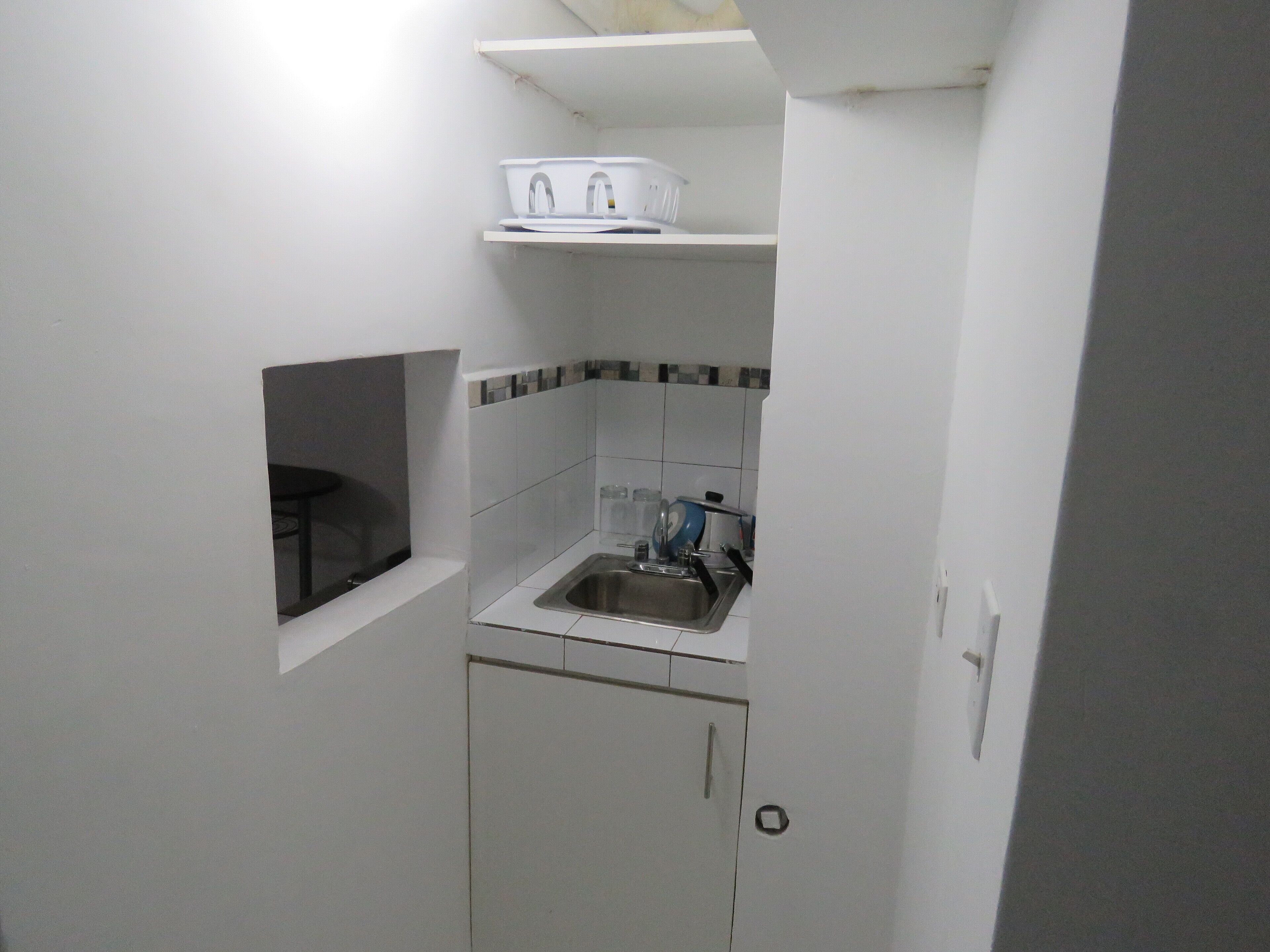 economy room | private kitchenette | stovetop